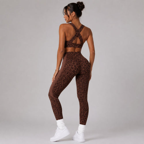 Back view of the Coffee Bean Animal Instincts Cougar Set showing the cross-back sports bra and high-waisted leopard leggings