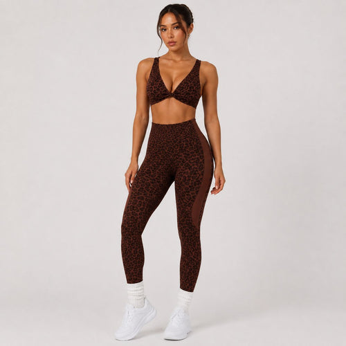 Front view of Animal Instincts Cougar Set in Coffee Bean leopard print with twist-front sports bra and high-waisted leggings